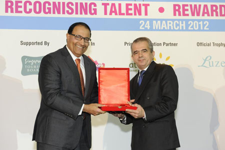 <br />Guest of Honour, S Iswaran, Minister, Prime Minister's Office and Second Minister for Trade & Industry & Home Affairs presents our second inductee Philippe Pau the plaque for the World Gourmet Series Awards Of Excellence Hall Of Fame for his hospitable service in the industry. <br />